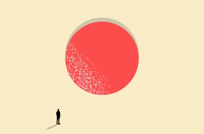 Visual illustration of a silhouette man looking up at a big red circle