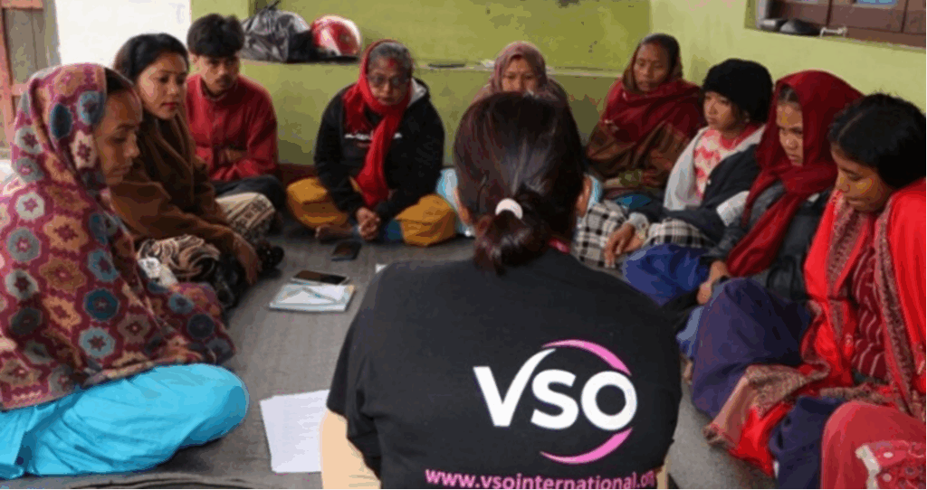 Women sitting in a circle at a focus group discussion in Nepal